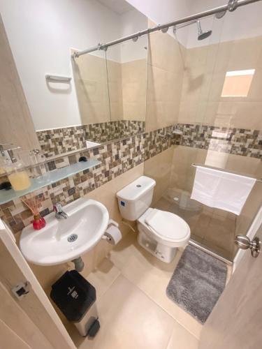 Koupelna v ubytování Apartamento comodo en la tebaida