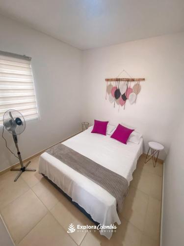 Postel nebo postele na pokoji v ubytování Apartamento comodo en la tebaida