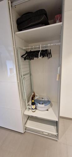 a refrigerator door is open in a kitchen at Sjöviksvilla Sjöviksvägen in Växjö