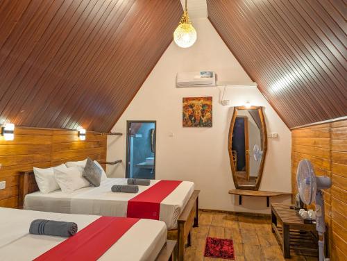 Ένα ή περισσότερα κρεβάτια σε δωμάτιο στο Wooden Cabana Sigiriya