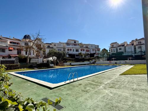 Bazén v ubytování Bungalow Cabo Huertas nebo v jeho okolí