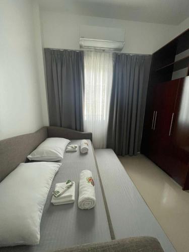 Katil atau katil-katil dalam bilik di 3BD Cozy home in Panglao with Van Service