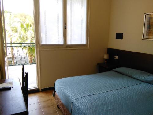 Postel nebo postele na pokoji v ubytování Ristorante Hotel Mira