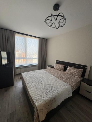 Ένα ή περισσότερα κρεβάτια σε δωμάτιο στο Vacay apartment
