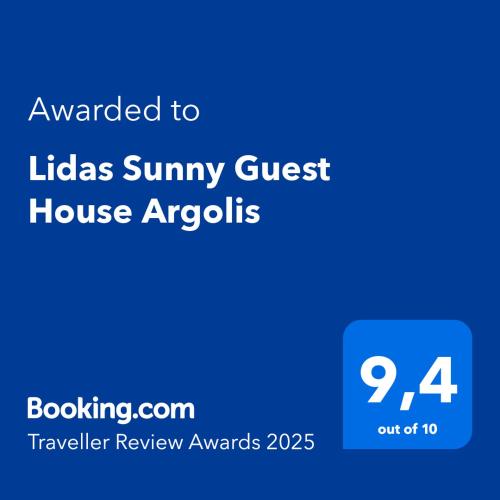a blue sign with the text awarded to lisas simmy guest house ap at Lidas Sunny Guest House Argolis in Nafplio
