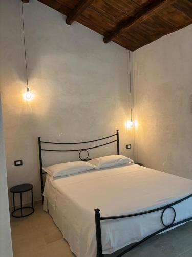 Ένα ή περισσότερα κρεβάτια σε δωμάτιο στο Casa Ellera