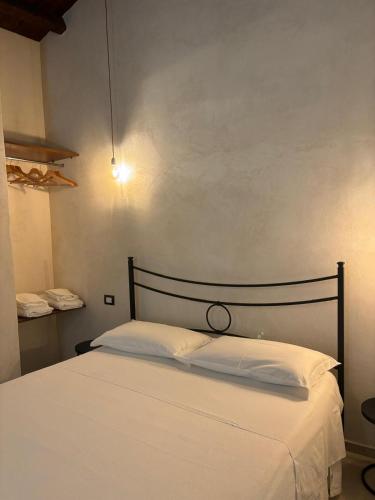 Ένα ή περισσότερα κρεβάτια σε δωμάτιο στο Casa Ellera