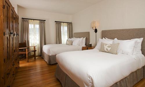 Postel nebo postele na pokoji v ubytování Hotel St Francis