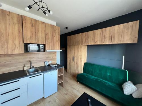 Dapur atau dapur kecil di Mikroapartament Wrocławska - Blisko Centrum i PKP