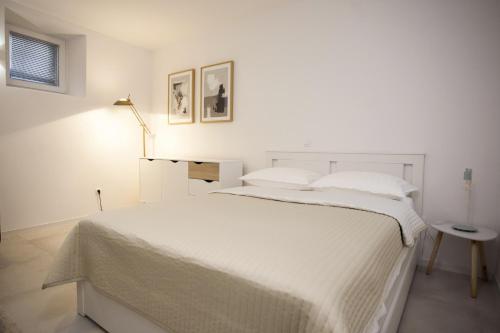 Posteľ alebo postele v izbe v ubytovaní Studio Apartment Jon