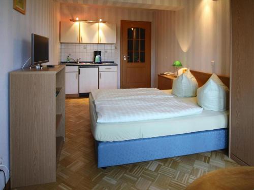 Η κουζίνα ή μικρή κουζίνα στο Apartment in fir with a balcony or a terrace