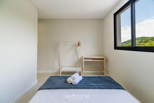 Katil atau katil-katil dalam bilik di Apartamento em Praia Brava de Itajaí - PVG0501