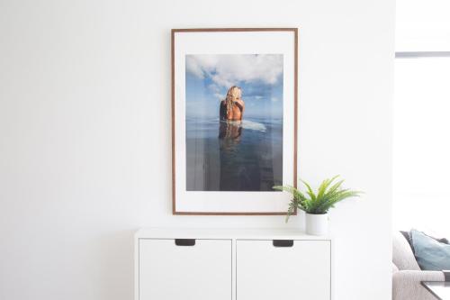 a picture of a woman in the water on the beach at Praceta Porthaus - entire private main home in Santo Isidoro