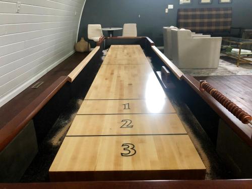 a bowling alley with numbers on it at Barn of Three Oaks near Lake Michigan and Journeyman in Three Oaks