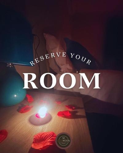 a candle on a table with the words preserve your room at Villa Noemi in Montefredane