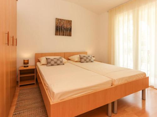 Ένα ή περισσότερα κρεβάτια σε δωμάτιο στο Villa Anita