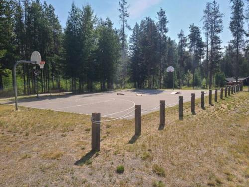 a basketball court with a basketball hoop at Stemwinder Duplex Chalet by StayIn in Kimberley