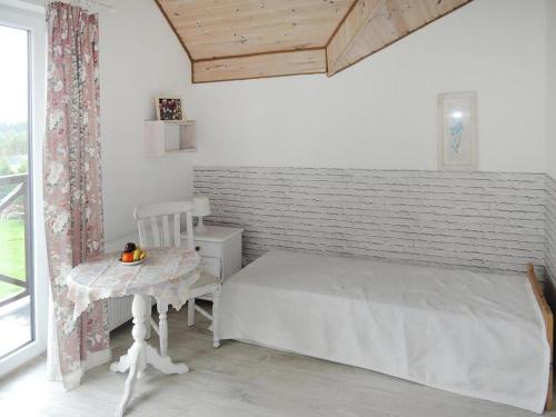 Katil atau katil-katil dalam bilik di Villa in Troszyn by Lake with Natural Beach