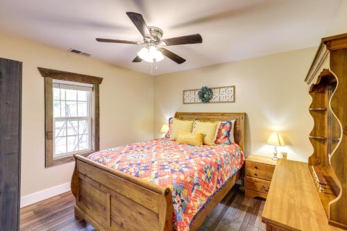 a bedroom with a bed and a ceiling fan at Hike and Relax Blue Ridge Mountain Retreat! in Burnsville