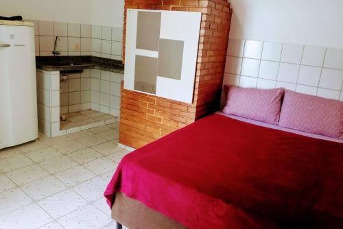Η κουζίνα ή μικρή κουζίνα στο Pousada & Hostel do Tchê
