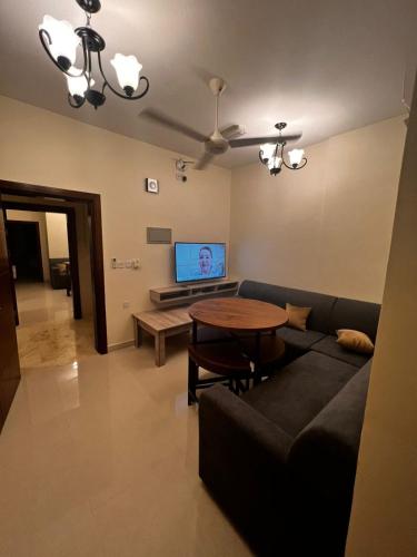 TV a/nebo společenská místnost v ubytování Al Bahjah Building