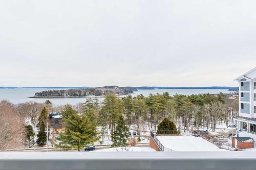 a view of the lake from the balcony of a house at Bluenose Inn - Bar Harbor Hotel in Bar Harbor