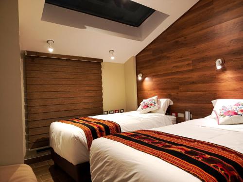 Katil atau katil-katil dalam bilik di Hotel Boutique PLAZA GIBAJA
