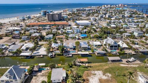 an aerial view of a city with a marina at Gulf Access, Heated Pool & Spa, Tiki Hut - Roelens in Fort Myers Beach
