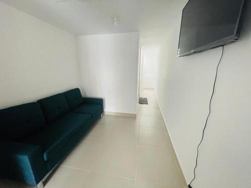 TV a/nebo společenská místnost v ubytování Exclusivo Apartamento en el Centro Histórico Trujillo - 3er Piso