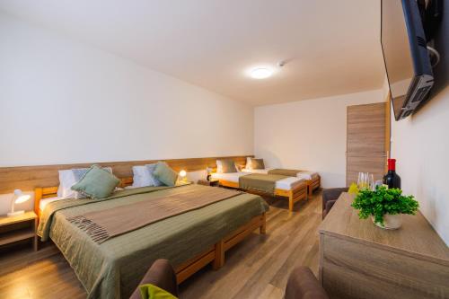 Postel nebo postele na pokoji v ubytování Hotel U Nádraží