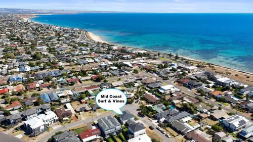 an aerial view of a city and the beach at Mid Coast Surf & Vines By Wine Coast Holidays in Port Noarlunga South