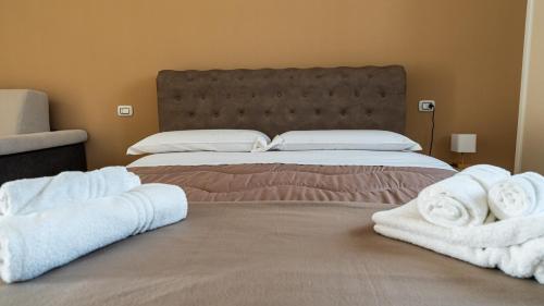 Кровать или кровати в номере Agriturismo MASSERIA QUISISANA