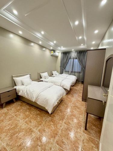 Giường trong phòng chung tại Rest house