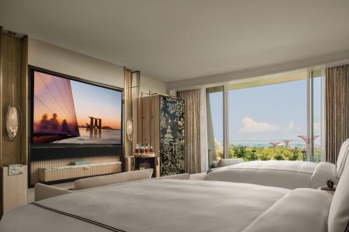Ένα ή περισσότερα κρεβάτια σε δωμάτιο στο Marina Bay Sands