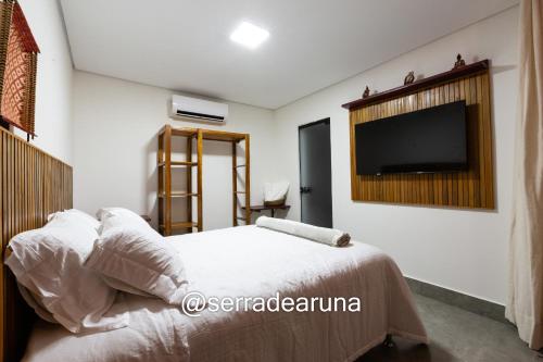 Katil atau katil-katil dalam bilik di Serra de Aruna