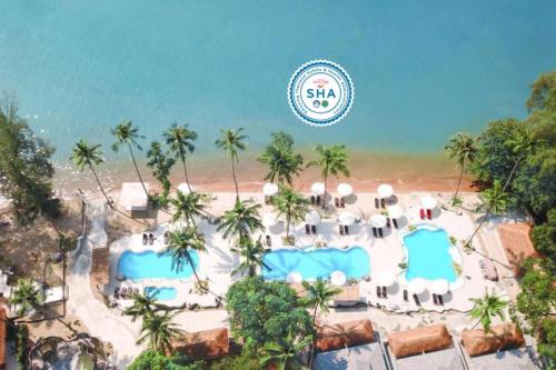 an aerial view of the beach at the six senses resort at Villa Cha-Cha Krabi Beachfront Resort in Ao Nam Mao