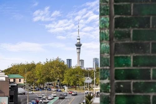 a view of the berlin tv tower from a city street at Greenhouse Apartments by Urban Rest in Auckland
