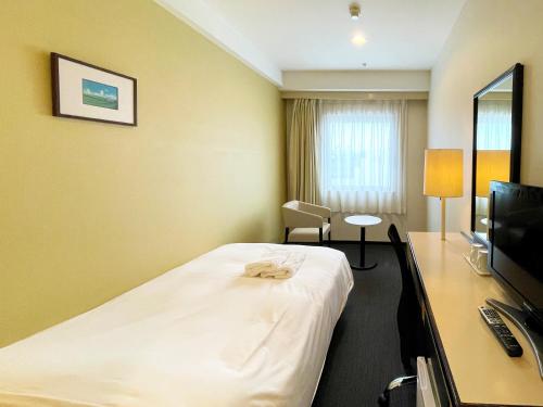 TV a/nebo společenská místnost v ubytování Smile Hotel Yonago