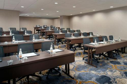 a room with rows of tables and chairs at The Westin San Antonio North in San Antonio