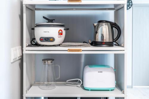 Kaffe- og tefaciliteter på Jesselton Quay by SNUG SPACE