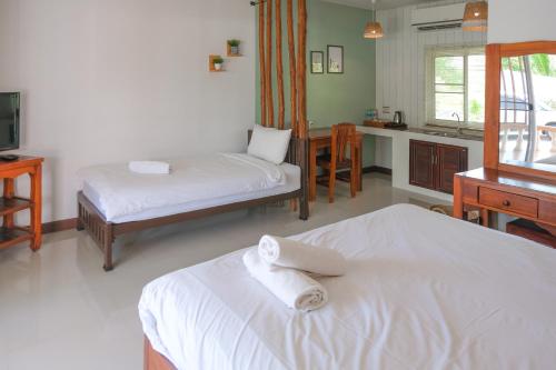 Ένα ή περισσότερα κρεβάτια σε δωμάτιο στο เธอ วิลล่า THER villa