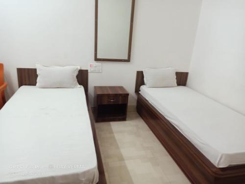 Voodi või voodid majutusasutuse Kumar guest house toas