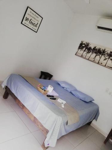 Una cama o camas en una habitación de Villa Ge