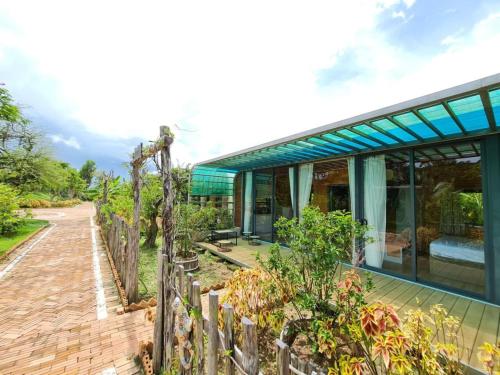 Κήπος έξω από το Sim Homestay