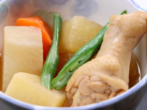 a bowl of food with vegetables and meat at Business Hotel Nishikiryu in Kiryu