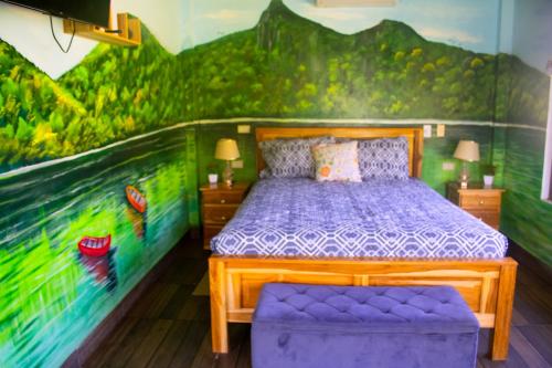 Postel nebo postele na pokoji v ubytování Casa Elalto Panamá - Cabaña de Montaña En San Carlos Panamá