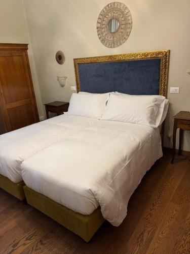 Ένα ή περισσότερα κρεβάτια σε δωμάτιο στο Hotel Guerrato