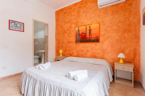 Una cama o camas en una habitación de Giada