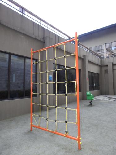 an orange ladder in front of a building at Taj Guras Kutir Resort & Spa, Gangtok in Gangtok