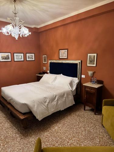 Ένα ή περισσότερα κρεβάτια σε δωμάτιο στο Hotel Guerrato